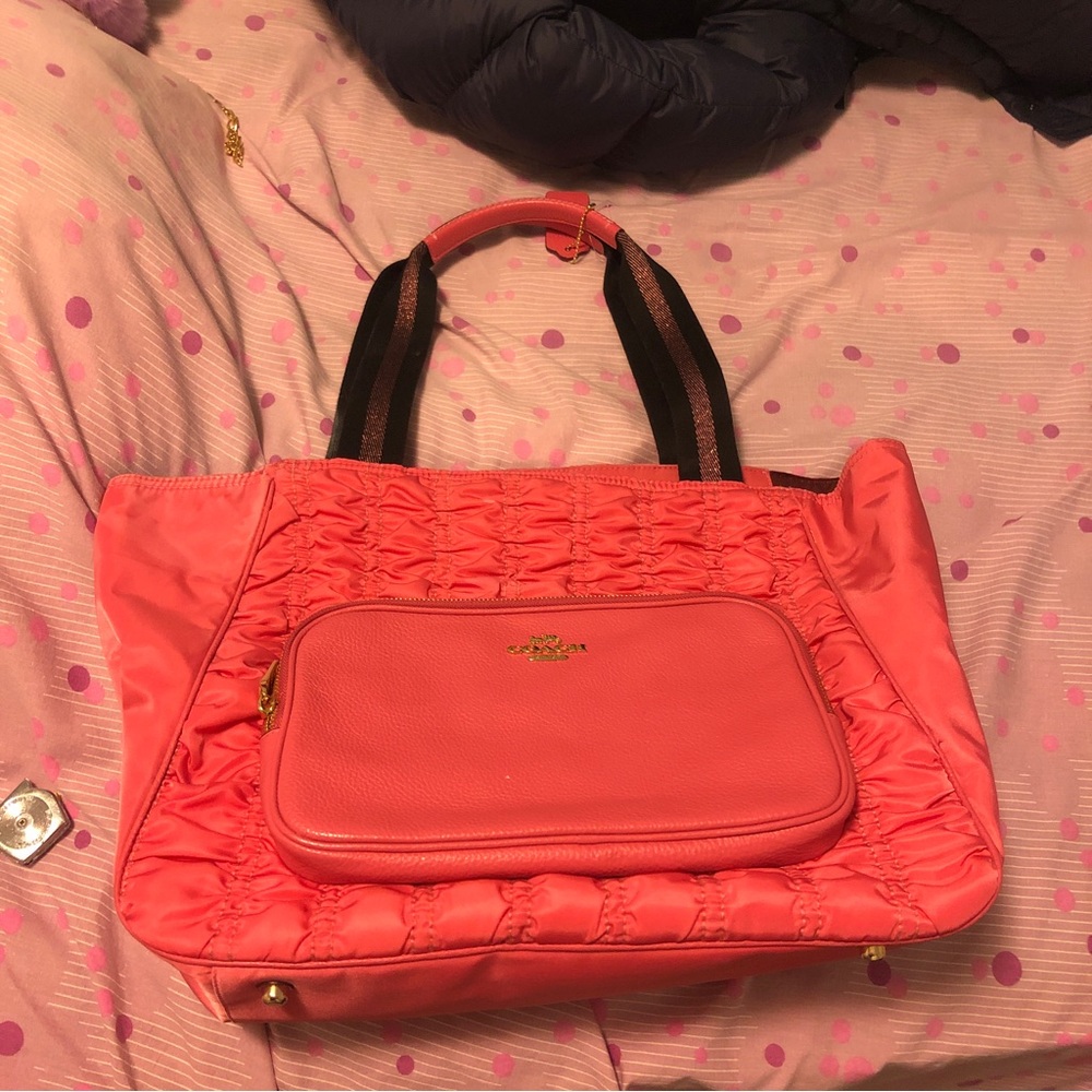 Pink coach sling purse bag
